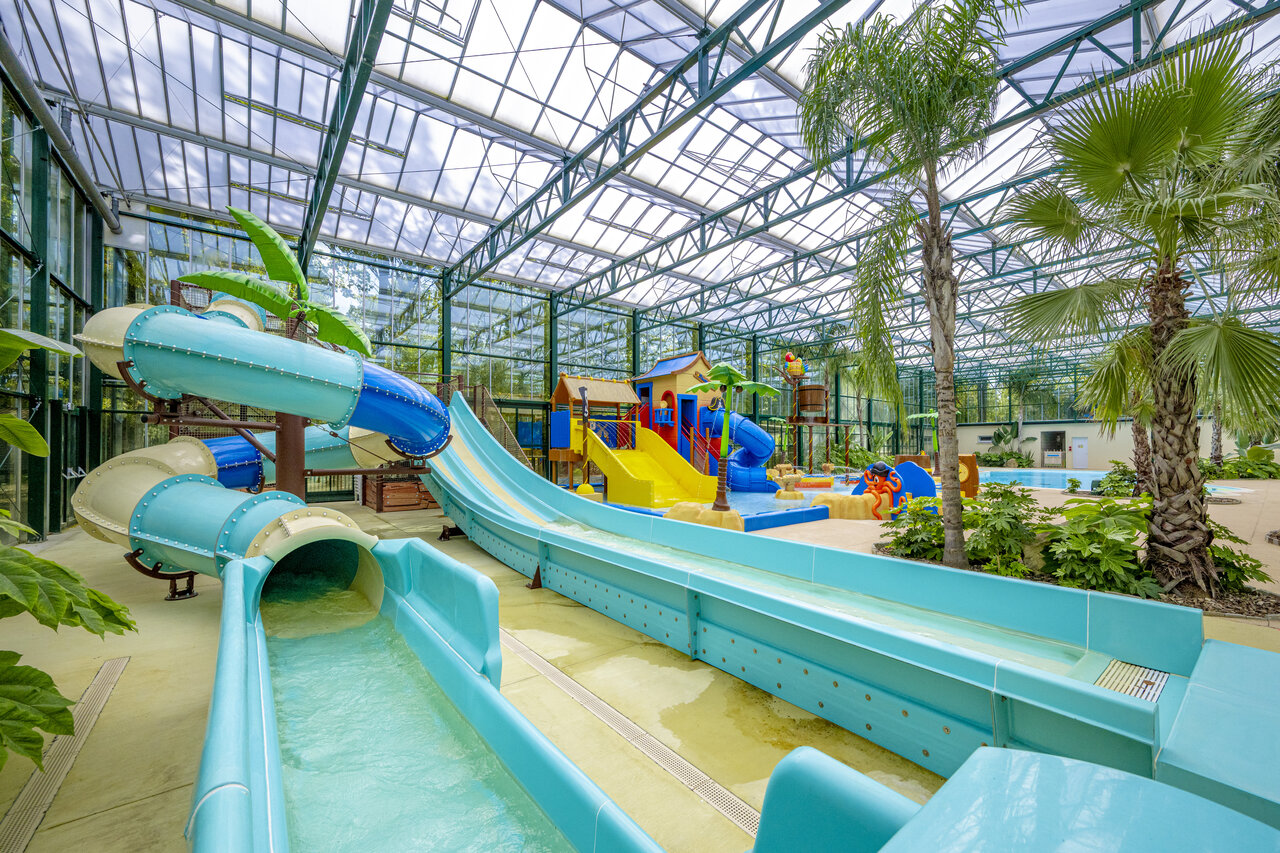 Water slides, covered water playground at CLICOCHIC La For�t d'Azal�e campsite.