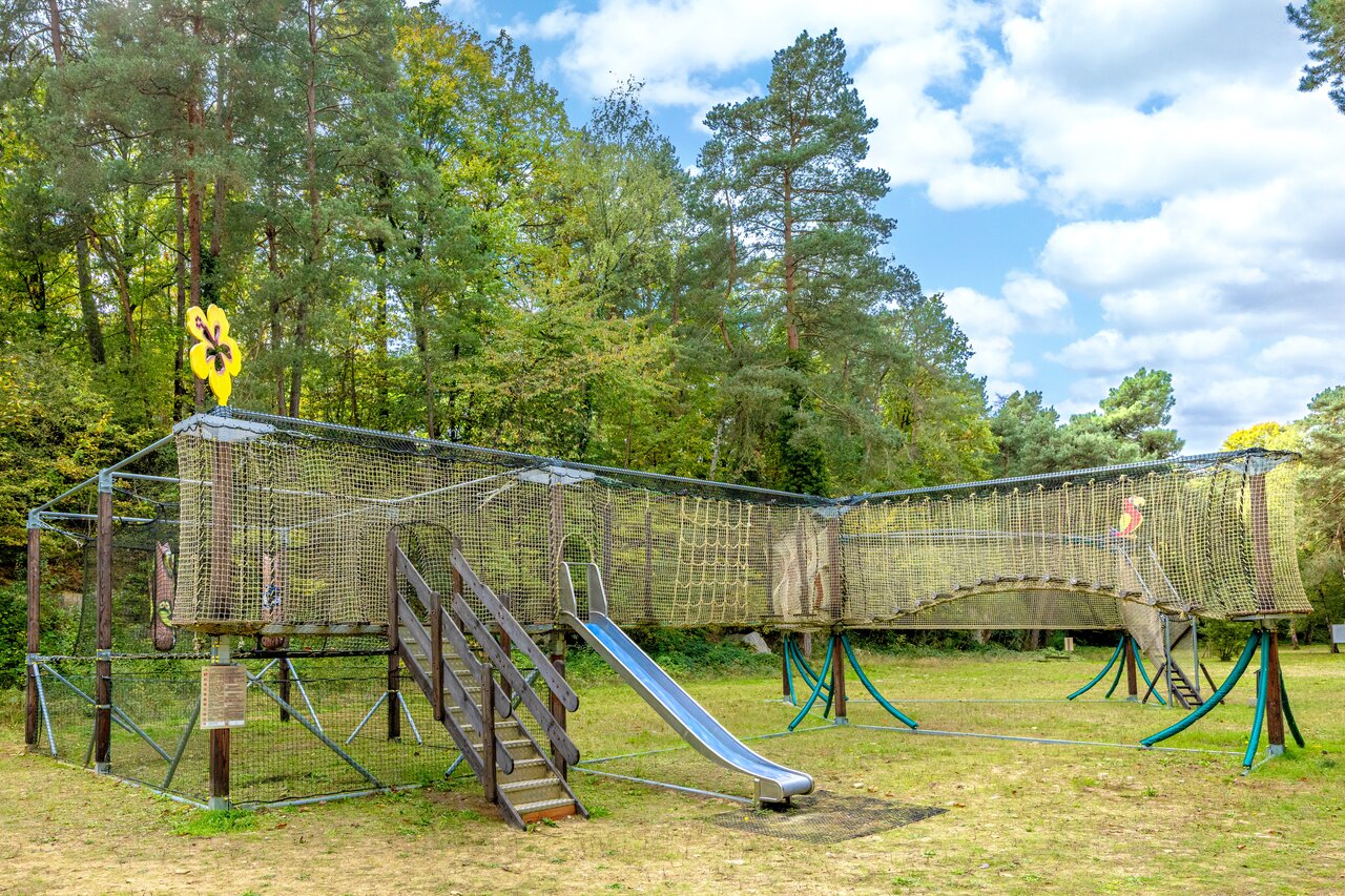 Net play adventure course at CLICOCHIC La For�t d'Azal�e campsite.