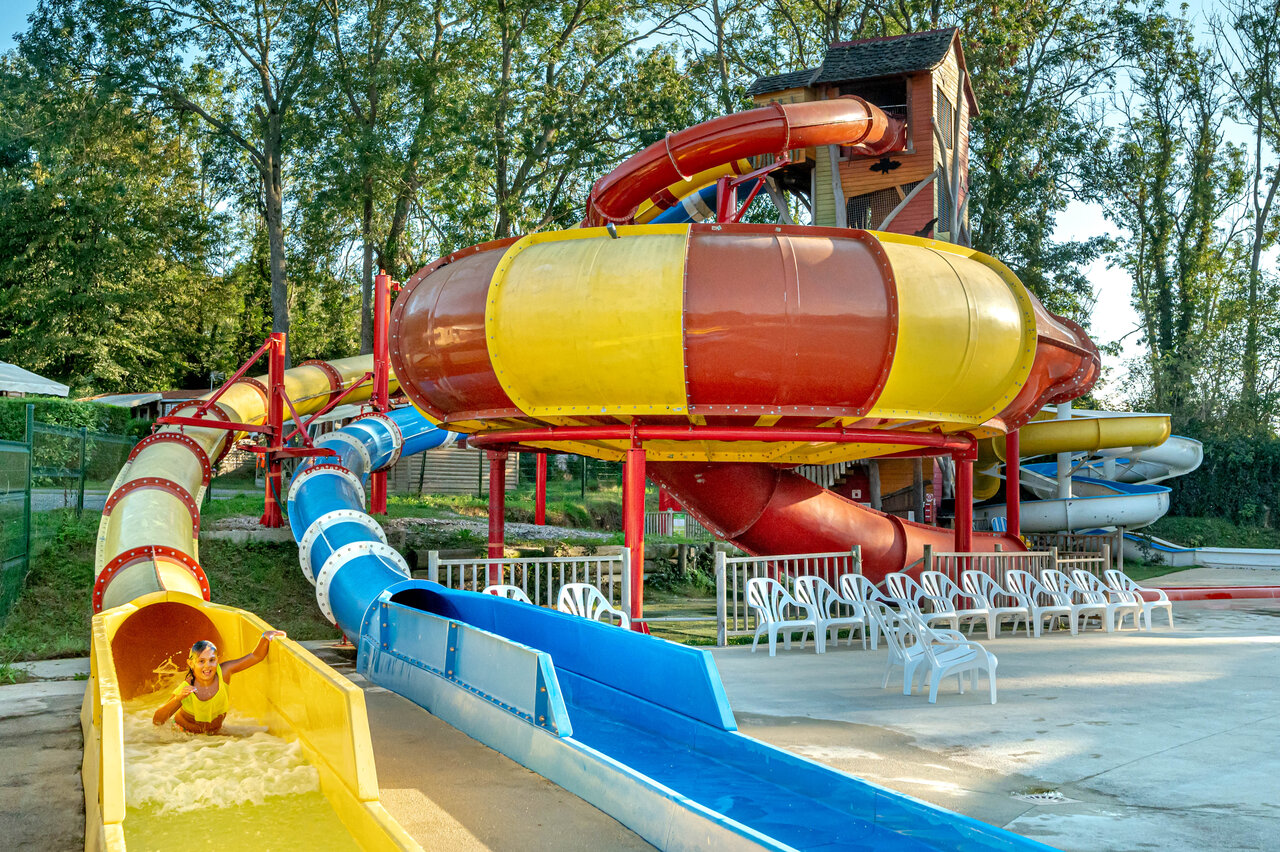 Child on giant water slide at CAPFUN Fredland campsite in Tournan en Brie (77)