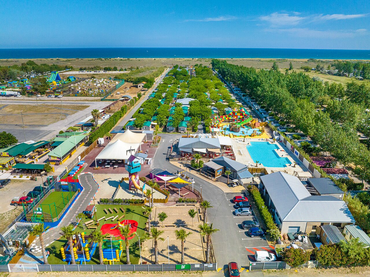 Vue a�rienne camping, parc aquatique, piscine, Mobil-homes CLICOCHIC Palmira Beach (34).